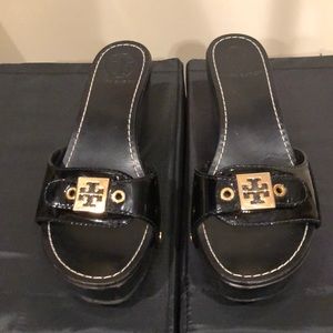 Tory Burch black patent leather wedges.